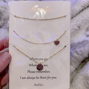 Gold k letter necklace, gold and gold heart pendant necklace! Never opened